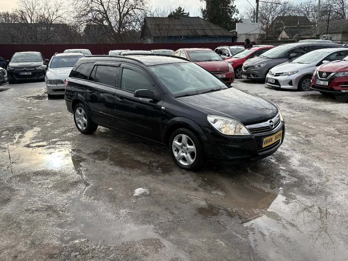 Opel Astra - фото 1