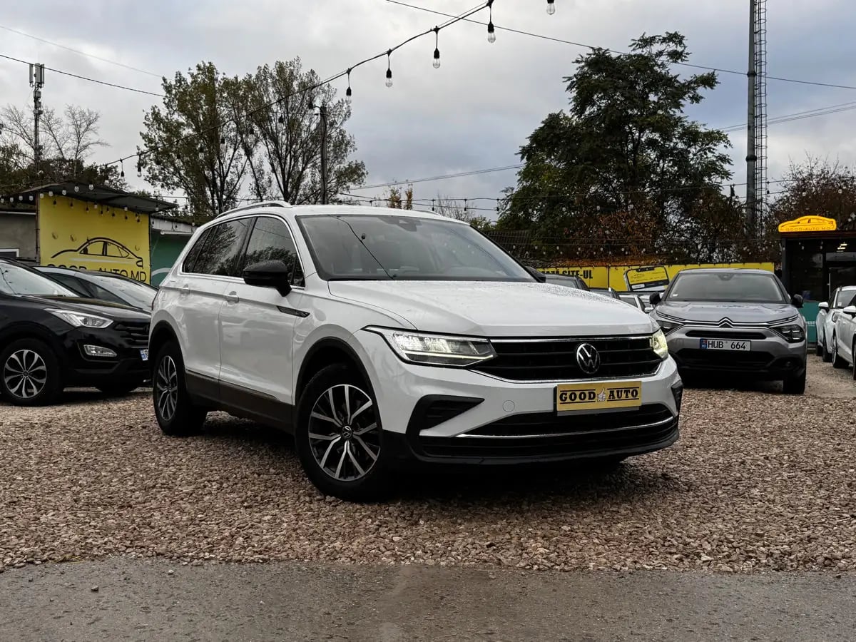 Volkswagen Tiguan - фото 1
